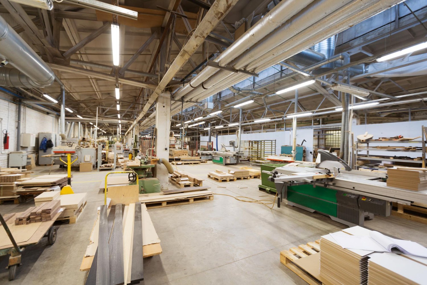 turii Unit 02 joinery floor with panel saw and timber stock