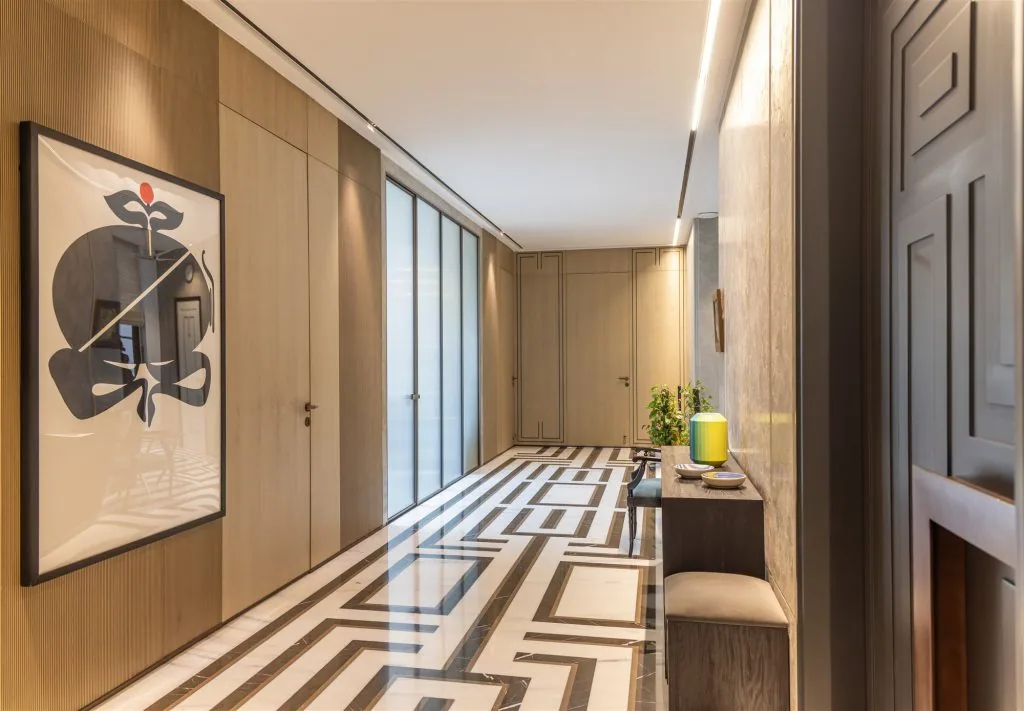 Entrance corridor with panelled joinery and inlaid marble floor — Gulmohar Park