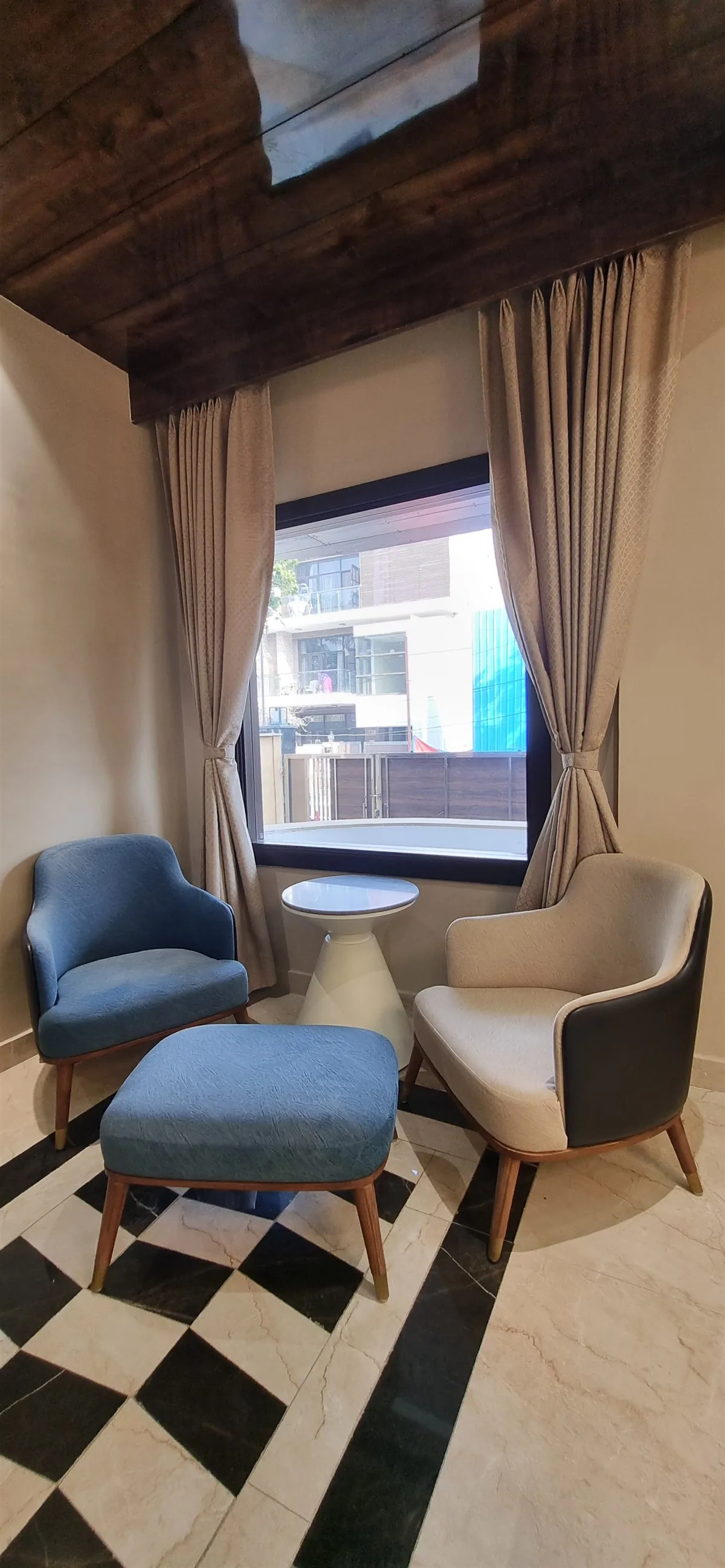 Seating nook with panelled timber ceiling — Mr Mohak residence